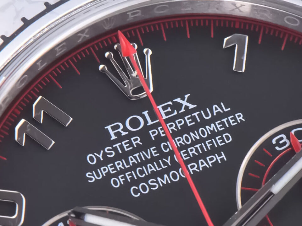 Close-up of the Cosmograph Daytona Stainless Steel Oysterflex watch with Matte Black 'Racing Dial' and red accents.