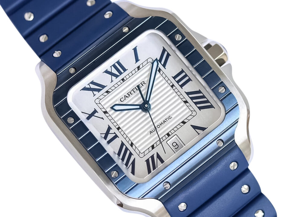 Santos Large Stainless Steel watch with white dial, blue bezel, Roman numerals, and rubber strap (40mm).