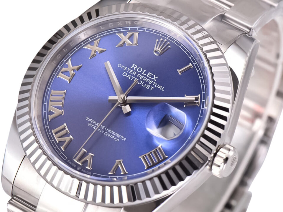 Datejust 41 Stainless Steel watch with Oyster bracelet, silver fluted bezel, and blue dial featuring Roman numerals.