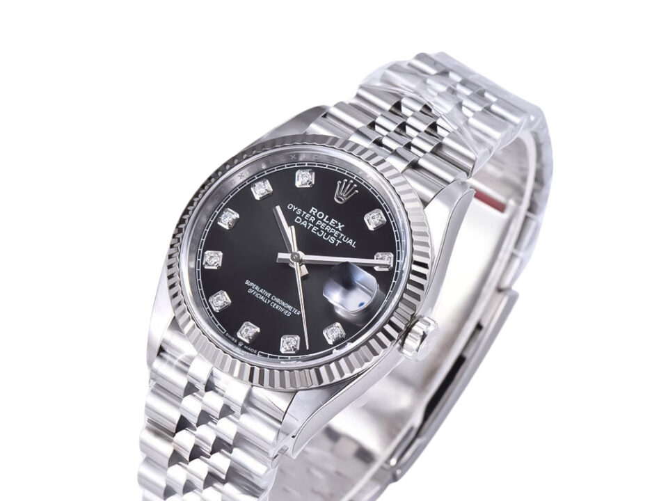 Datejust 36 stainless steel watch with Jubilee bracelet, diamond black dial, and fluted bezel displayed at an angle.