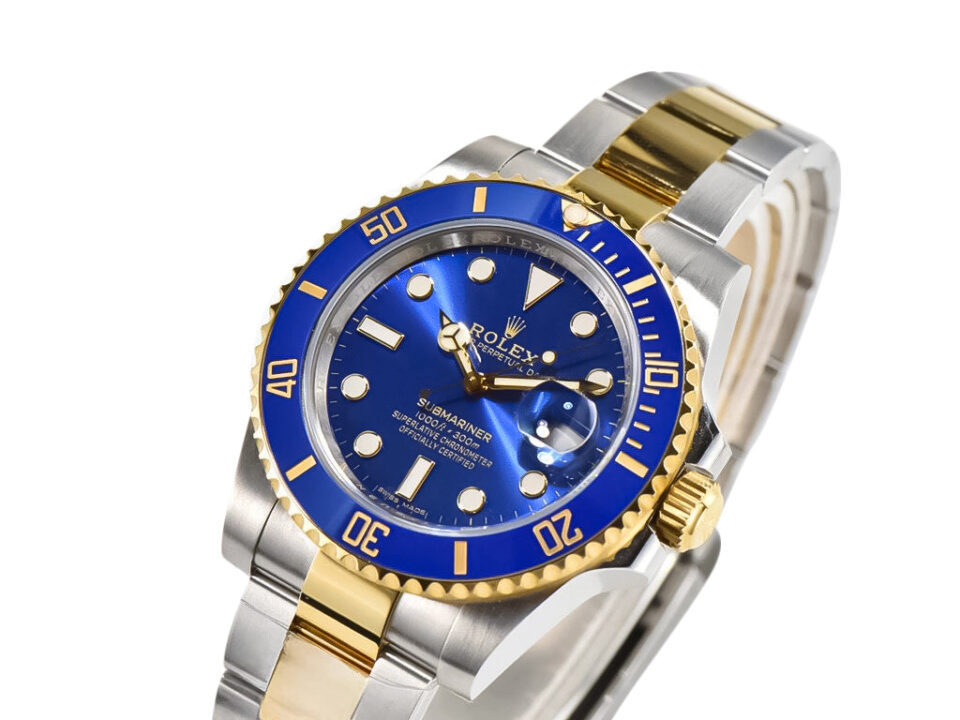 Two-tone Submariner Date watch with yellow gold and stainless steel, featuring a blue dial and bezel on product display.