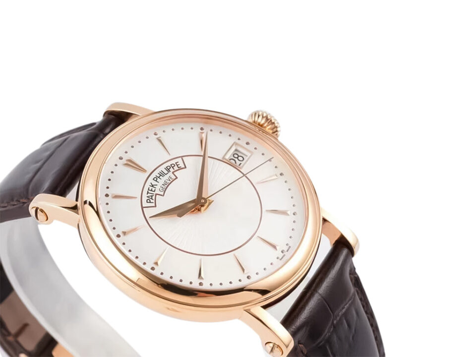 Calatrava Rose Gold with Silver Guilloche Dial (38mm) watch featuring a sleek design and brown leather strap, at an angle.