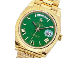 Day-Date 40 Yellow Gold 'President' watch with green dial, Roman numerals, fluted bezel, and bracelet.