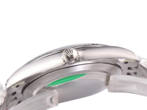 Side view of Datejust 41 Stainless Steel ‘Wimbledon’ on Jubilee bracelet with fluted bezel, showcasing the Rolex crown logo.