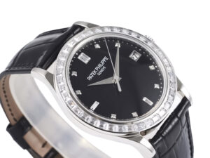 Calatrava Stainless Steel watch with Diamond Black Dial, Diamond Bezel (38mm), and black leather strap displayed at an angle.
