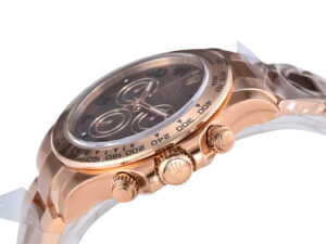 Cosmograph Daytona Rose Gold watch with Chocolate Dial, Arabic numerals, and side view highlighting the crown and pushers.