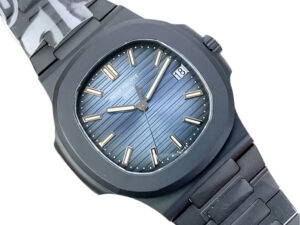 Nautilus 'Black Venom' Limited Edition Carbon Steel watch with blue dial, gold hour markers, and a 40mm case on display.