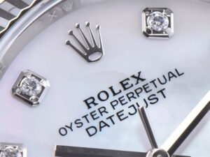 Close-up of the Datejust 36 Stainless Steel on Jubilee with Diamond Mother of Pearl Dial, Fluted Bezel, and Rolex crown logo.