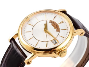 Calatrava Yellow Gold watch with a 38mm case, silver guilloche dial, and brown leather strap displayed at an angled view.