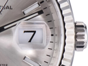 Close-up of the Datejust 36 Stainless Steel on Jubilee with Silver Dial, Fluted Bezel, magnified date display showing "7".