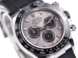 Cosmograph Daytona Stainless Steel Oysterflex with Grey Sunburst Dial, featuring black subdials and a sleek rubber strap.