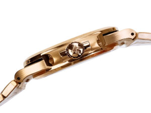 Side view of the Nautilus Rose Gold 40mm watch with a chocolate dial, showcasing its rose gold case and crown detail.