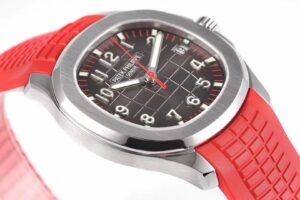 Aquanaut Stainless Steel ‘Singapore’ watch with black dial (40mm) and red rubber strap, featuring a date display.