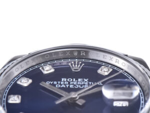 Close-up view of the Datejust 36 with Diamond Blue Dial, Fluted Bezel, and Jubilee Bracelet showcasing elegant details.