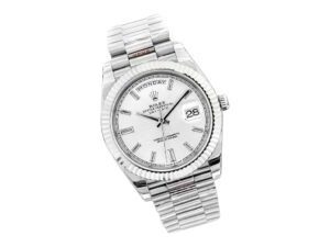 Day-Date 40 White Gold ‘President’ watch with silver diamond dial, fluted bezel, and bracelet displayed on white background.
