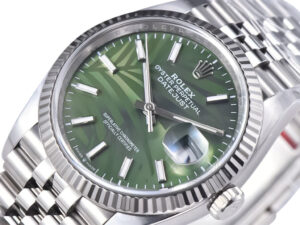 Datejust 36 Stainless Steel watch with a green palm motif dial, fluted bezel, and Jubilee bracelet on display.