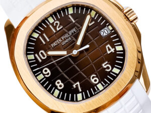 Aquanaut Rose Gold watch with a chocolate dial, white strap, 40mm size; features gold accents and date display at 3 o'clock.