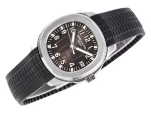 Aquanaut Stainless Steel watch with black dial, 38mm, featuring white numerals and a black rubber strap.