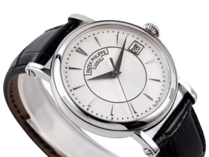 Calatrava Stainless Steel watch with 38mm silver guilloche dial, black leather strap, and date display at 3 o'clock.