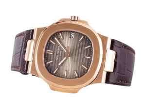 Nautilus Rose Gold watch with chocolate dial, 40mm case, date display at 3 o’clock, and leather strap.