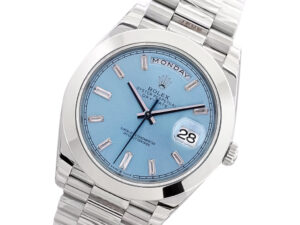 Day-Date 40 Platinum ‘President’ watch with ice blue diamond dial, smooth bezel, and platinum bracelet displayed.