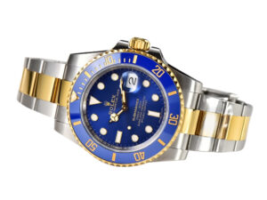 Submariner Date 'Two Tone' watch in yellow gold and stainless steel with blue dial, bezel, and date display.