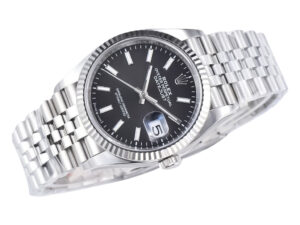 Datejust 36 Stainless Steel on Jubilee bracelet with Black Dial, Fluted Bezel, and date display at 3 o'clock position.