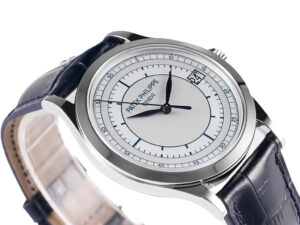 Calatrava Stainless Steel ‘Scientific’ with Silver Dial (38mm), featuring a blue leather strap and minimalist design.
