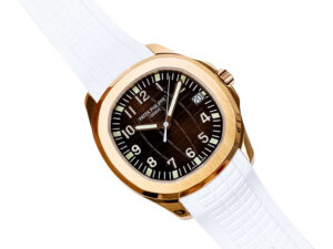 Aquanaut Rose Gold watch with a chocolate dial, white strap, and 40mm case displayed at an angled view.