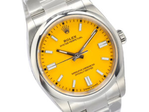 Oyster Perpetual 36 stainless steel watch with a vibrant yellow dial, silver hour markers, and a polished bracelet.