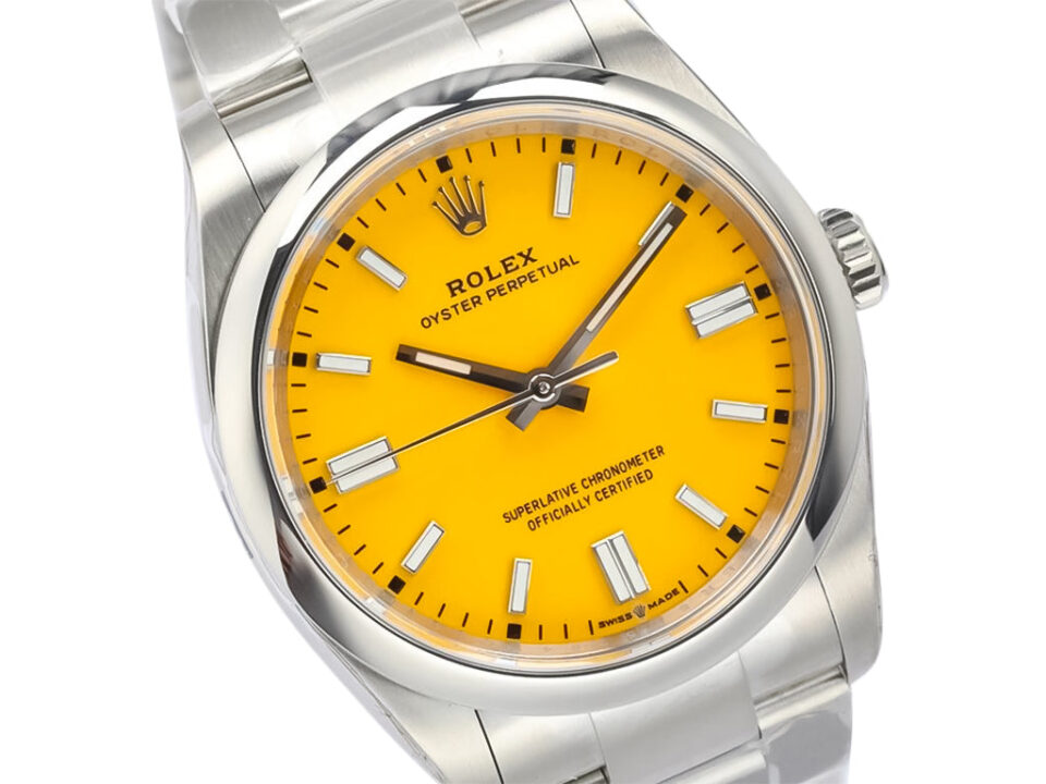 Oyster Perpetual 36 stainless steel watch with a vibrant yellow dial, silver hour markers, and a polished bracelet.