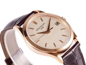 Calatrava Rose Gold with Ivory Dial (38mm) watch featuring a brown leather strap and date display at 3 o’clock.