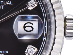 Close-up of the Datejust 36 Stainless Steel on Jubilee with Diamond Black Dial, showcasing a fluted bezel and date display.