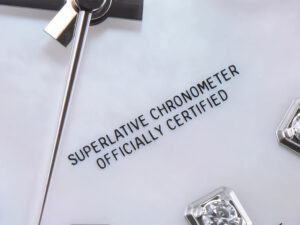 Close-up of the Datejust 36 dial featuring "Superlative Chronometer Officially Certified" text on diamond mother-of-pearl.