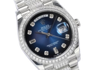 Day-Date 36 stainless steel watch with diamond blue ombre dial, diamond bezel, day display, and presidential bracelet.