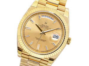 Day-Date 40 Yellow Gold 'President' watch with Champagne Diamond Dial, Fluted Bezel, and day-date display.