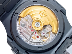 Close-up view of the open case back of the Nautilus 'Black Venom' Limited Edition, showing its intricate mechanism.