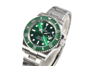 Submariner Date Stainless Steel ‘Hulk’ (40mm) with green dial and bezel, featuring a stainless steel bracelet design.
