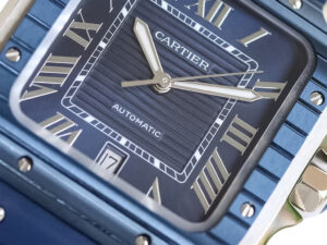 Close-up view of the Santos Large Stainless Steel with Blue Dial and Blue Bezel, featuring Roman numerals and a rubber strap.