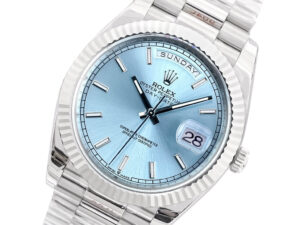 Day-Date 40 Platinum 'President' watch with ice blue dial, fluted bezel, and day-date display on a platinum bracelet.