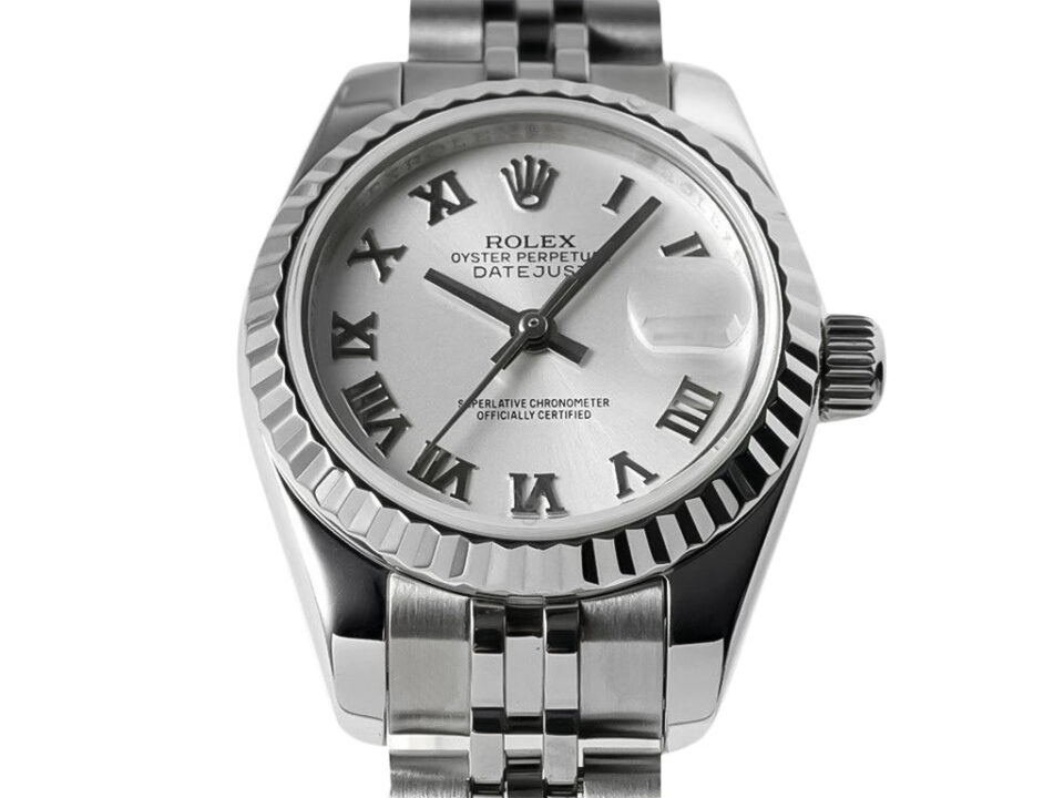 Lady-Datejust 28 Stainless Steel on Jubilee bracelet with white dial, Roman numerals, and fluted bezel displayed in close-up.