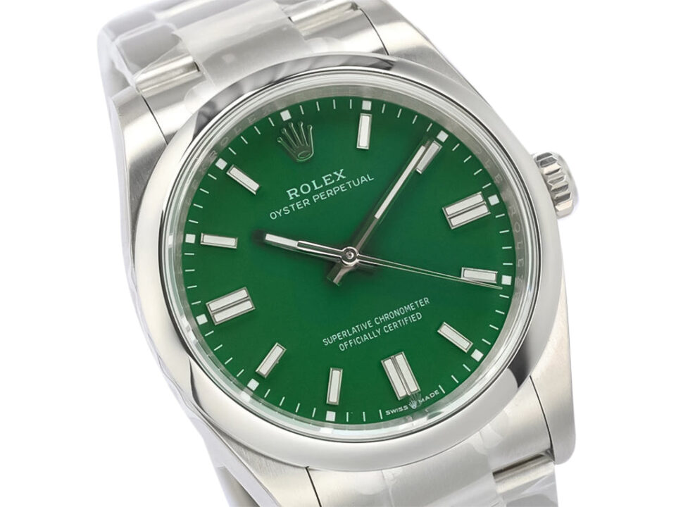 Oyster Perpetual 36 stainless steel watch with a green dial, featuring a sleek design and luminous hour markers.