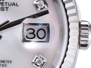 Close-up of the Datejust 36 Stainless Steel on Jubilee, featuring a diamond Mother of Pearl dial and fluted bezel.