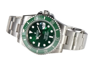 Stainless steel Submariner Date 'Hulk' watch, 40mm size, with a green dial and bezel, displayed at an angle on its bracelet.