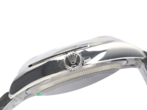 Side view of the Oyster Perpetual 36 Stainless Steel with crown logo, showcasing its polished case and sleek design.