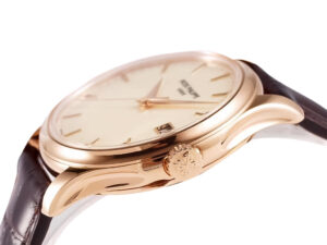 Side view of the Calatrava Rose Gold with Ivory Dial (39mm), showcasing polished rose gold case, intricate crown detailing.