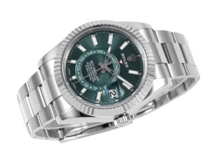 Sky-Dweller Stainless Steel watch on Oyster bracelet with green dial and fluted bezel, displayed at an angle.