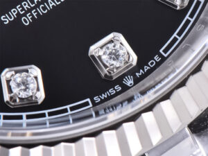 Close-up view of the Datejust 36 Stainless Steel watch with Diamond Black Dial, Fluted Bezel, and "Swiss Made" engraving.
