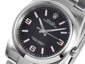Oyster Perpetual 36 Stainless Steel watch with black dial, pink Arabic numeral indices, polished bezel displayed up close.