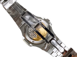 Back view of the Nautilus Stainless Steel with White Dial, showcasing the exposed mechanical movement and engraved clasp.
